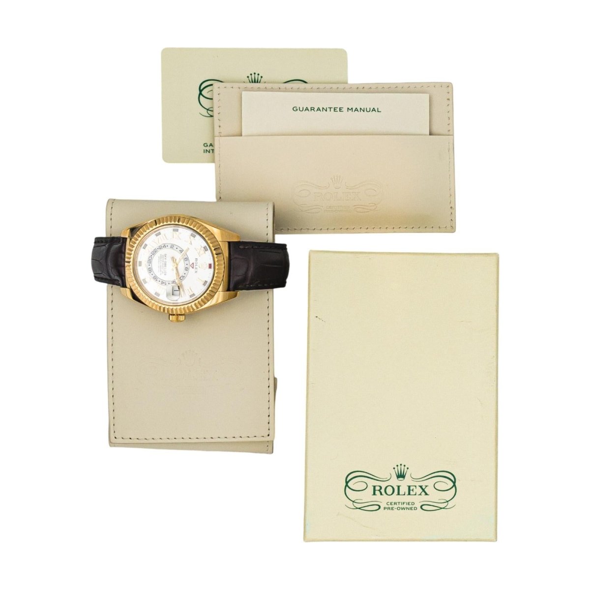 Montre ROLEX "Sky - Dweller" en or jaune, argent, cuir et saphir - Castafiore