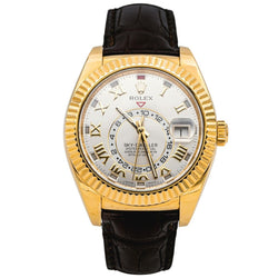 Montre ROLEX "Sky - Dweller" en or jaune, argent, cuir et saphir - Castafiore