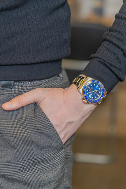 Montre ROLEX "Submariner" en or jaune et acier - Castafiore