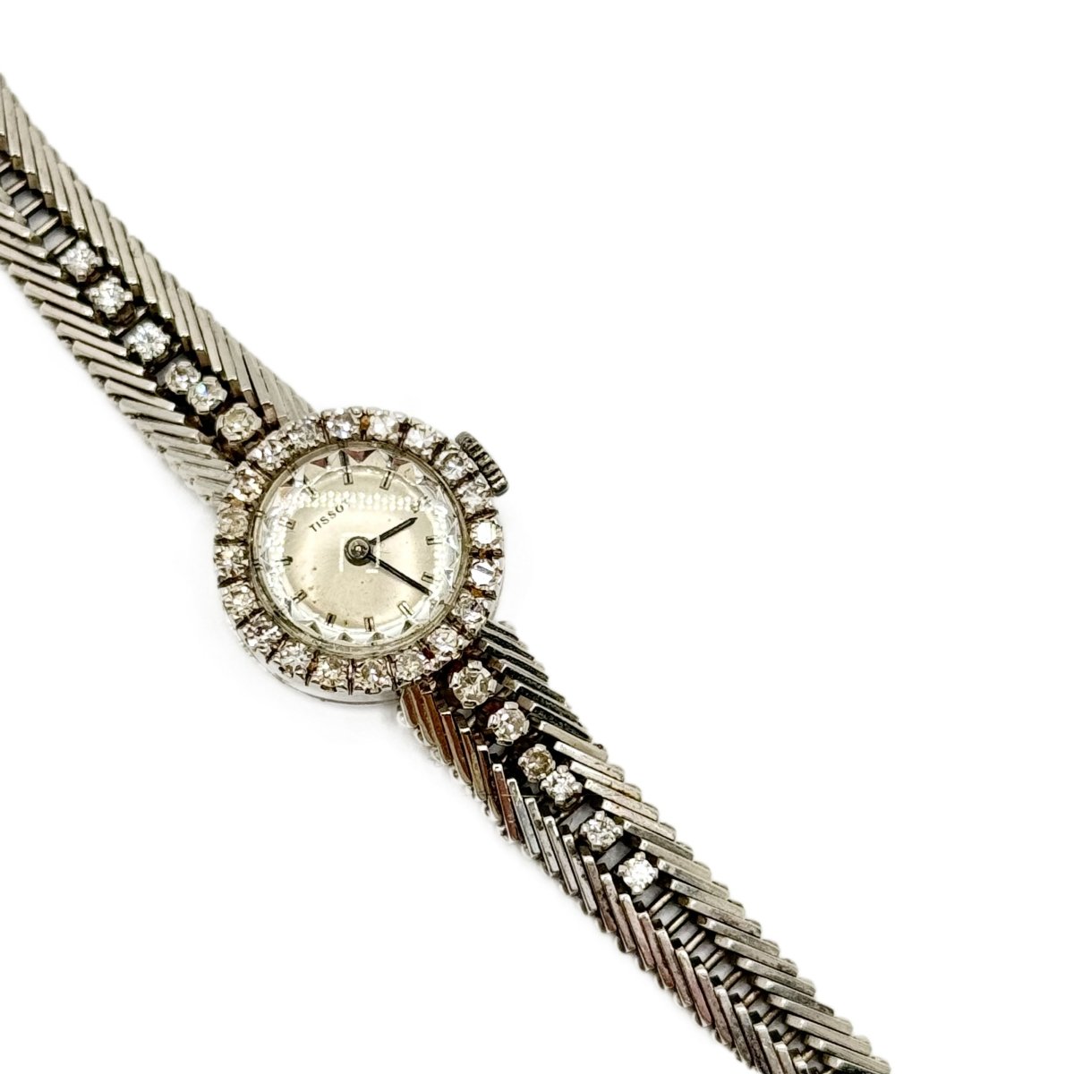 Montre TISSOT en or blanc et diamants - Castafiore