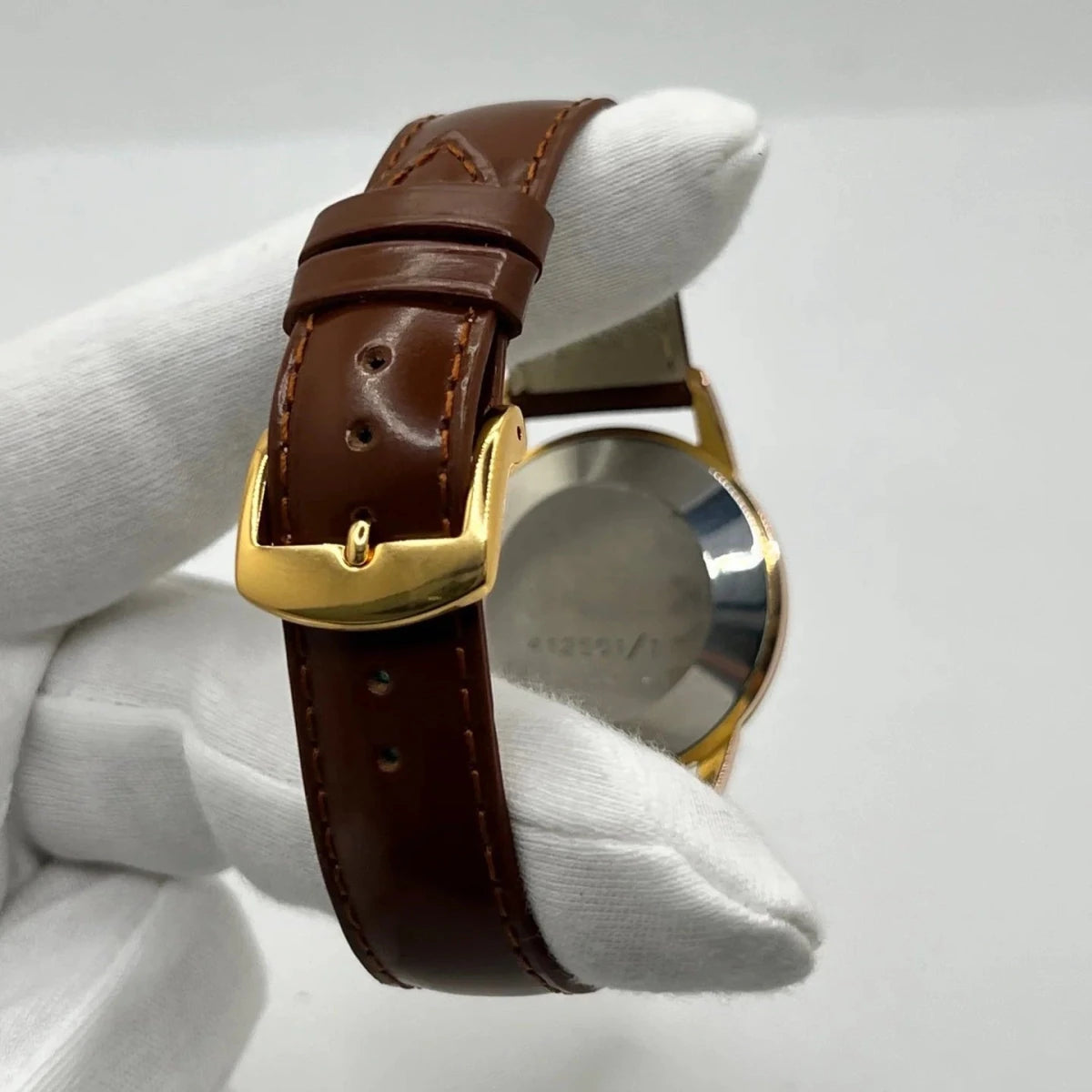 Montre UNIVERSAL GENÈVE plaqué or, acier et cuir - Castafiore