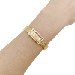 Montre UTI en or jaune et diamants - Castafiore
