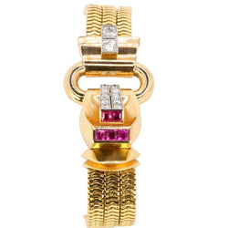 Montre UTI Secret tubogas en or jaune diamants rubis - Castafiore