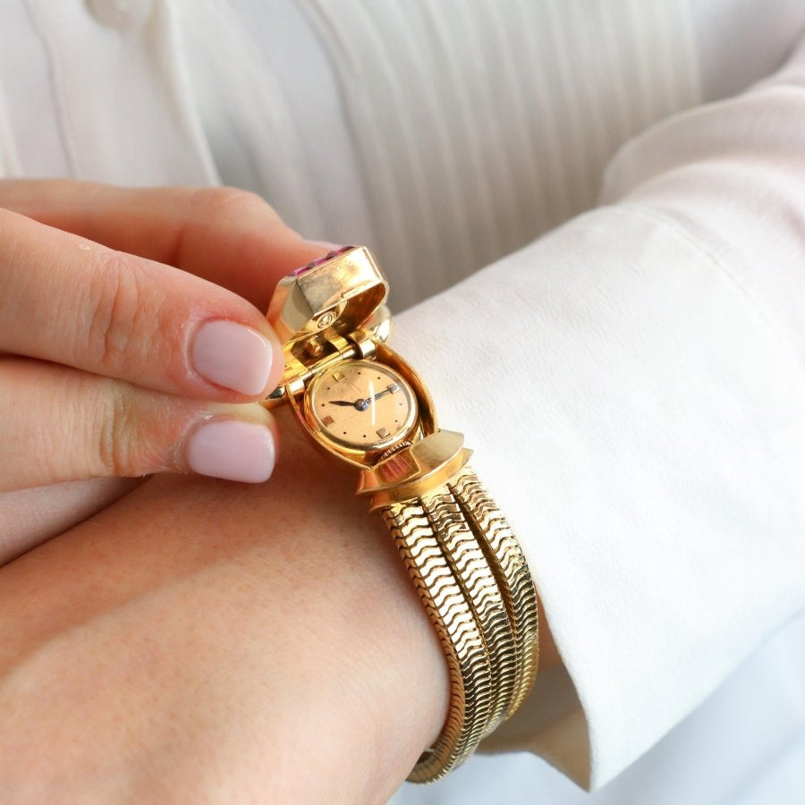 Montre UTI Secret tubogas en or jaune diamants rubis - Castafiore