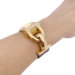 Montre Van Cleef & Arpels "Cadenas" or jaune, diamants, cuir. - Castafiore