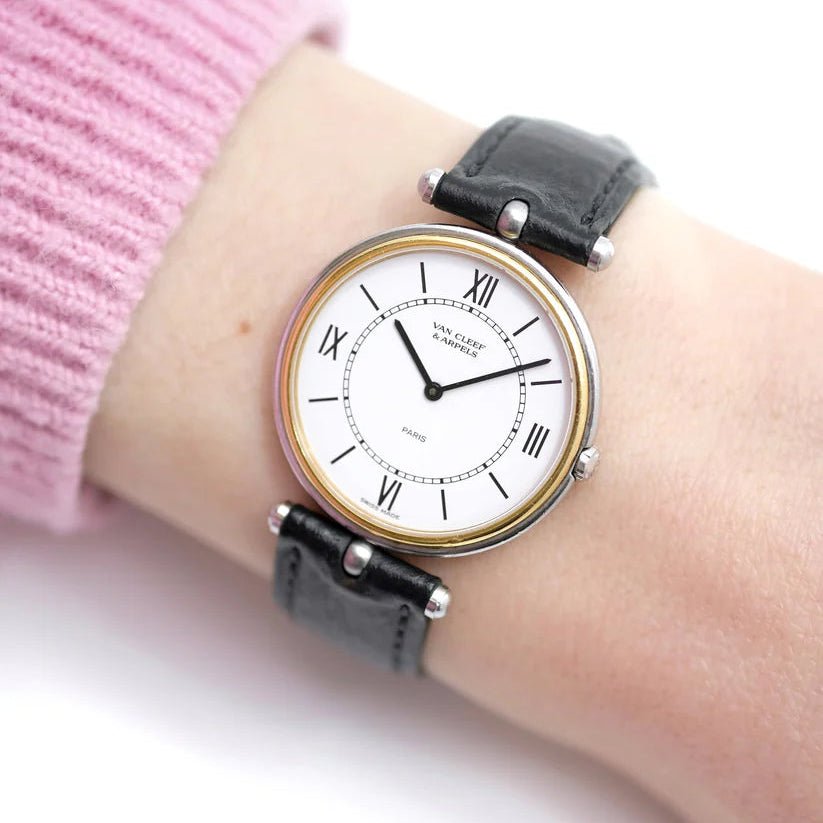 Montre VAN CLEEF & ARPELS "PA 49" en or jaune, acier et cuir - Castafiore