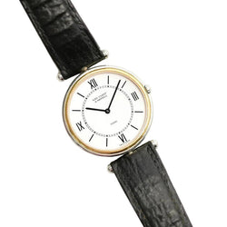 Montre VAN CLEEF & ARPELS "PA 49" en or jaune, acier et cuir - Castafiore