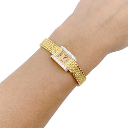 Montre vintage André Col, or jaune, platine, diamants. - Castafiore