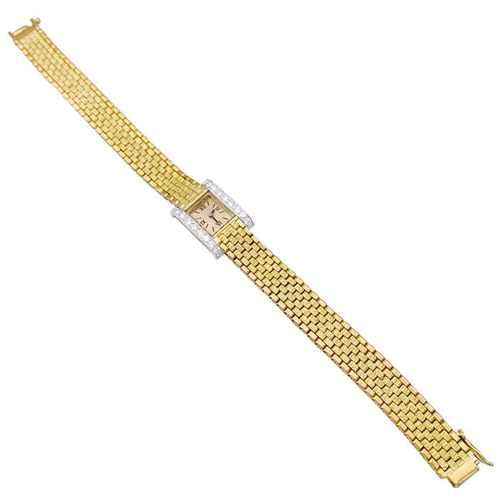Montre vintage André Col, or jaune, platine, diamants. - Castafiore