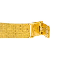 Montre ZENITH MOVADO en or jaune et oeil de tigre - Castafiore