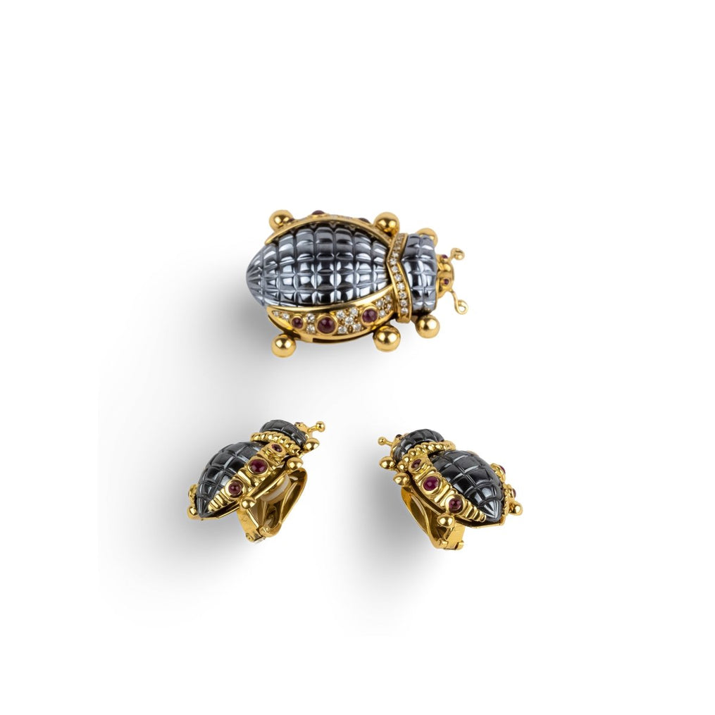 Parure Eva SEGOURA en or jaune, hématite et diamants - Castafiore