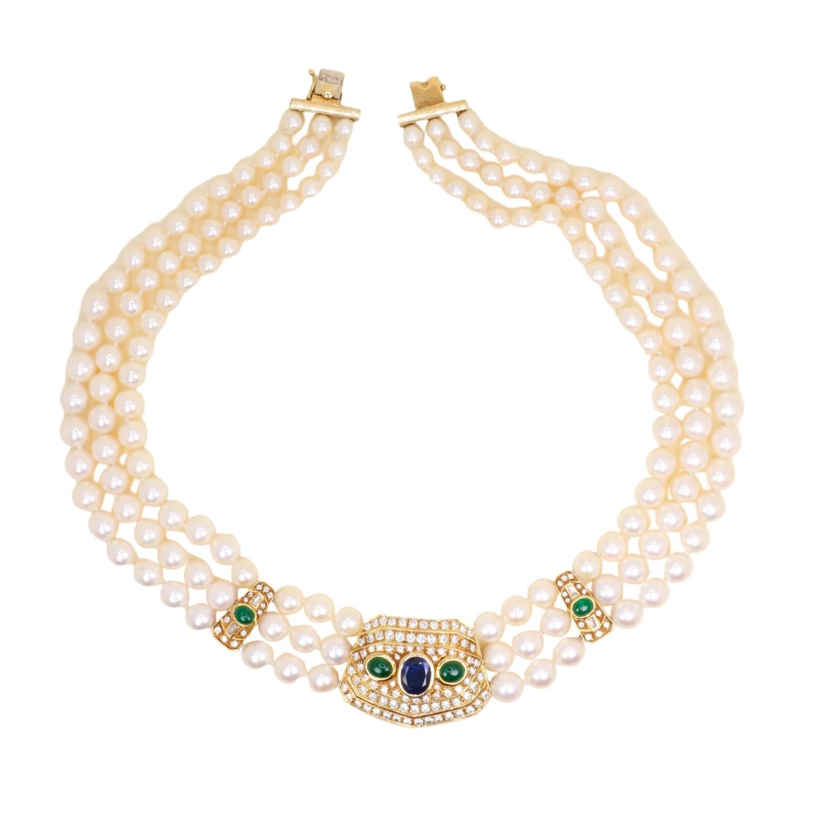 Parure REPOSSI en or jaune, perles, saphirs, émeraudes et diamants - Castafiore