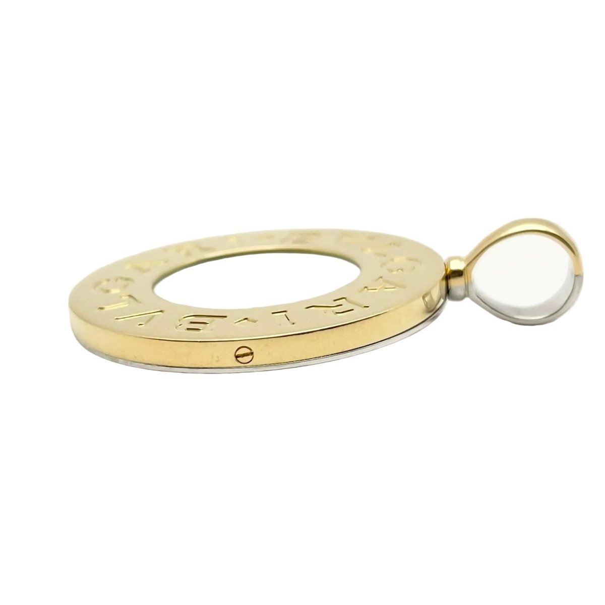 Pendentif BULGARI en or blanc, or jaune, nacre et onyx - Castafiore