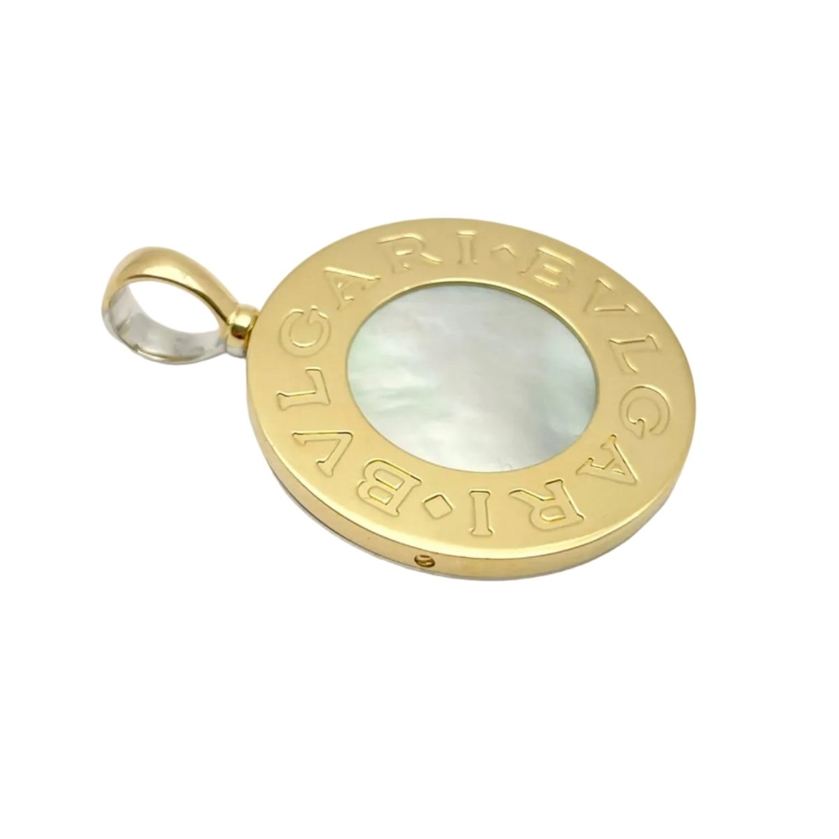 Pendentif BULGARI en or blanc, or jaune, nacre et onyx - Castafiore