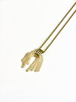 Pendentif CARTIER pompon en or jaune, or blanc, or rose et perles - Castafiore