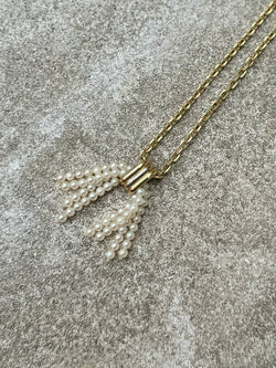 Pendentif CARTIER pompon en or jaune, or blanc, or rose et perles - Castafiore