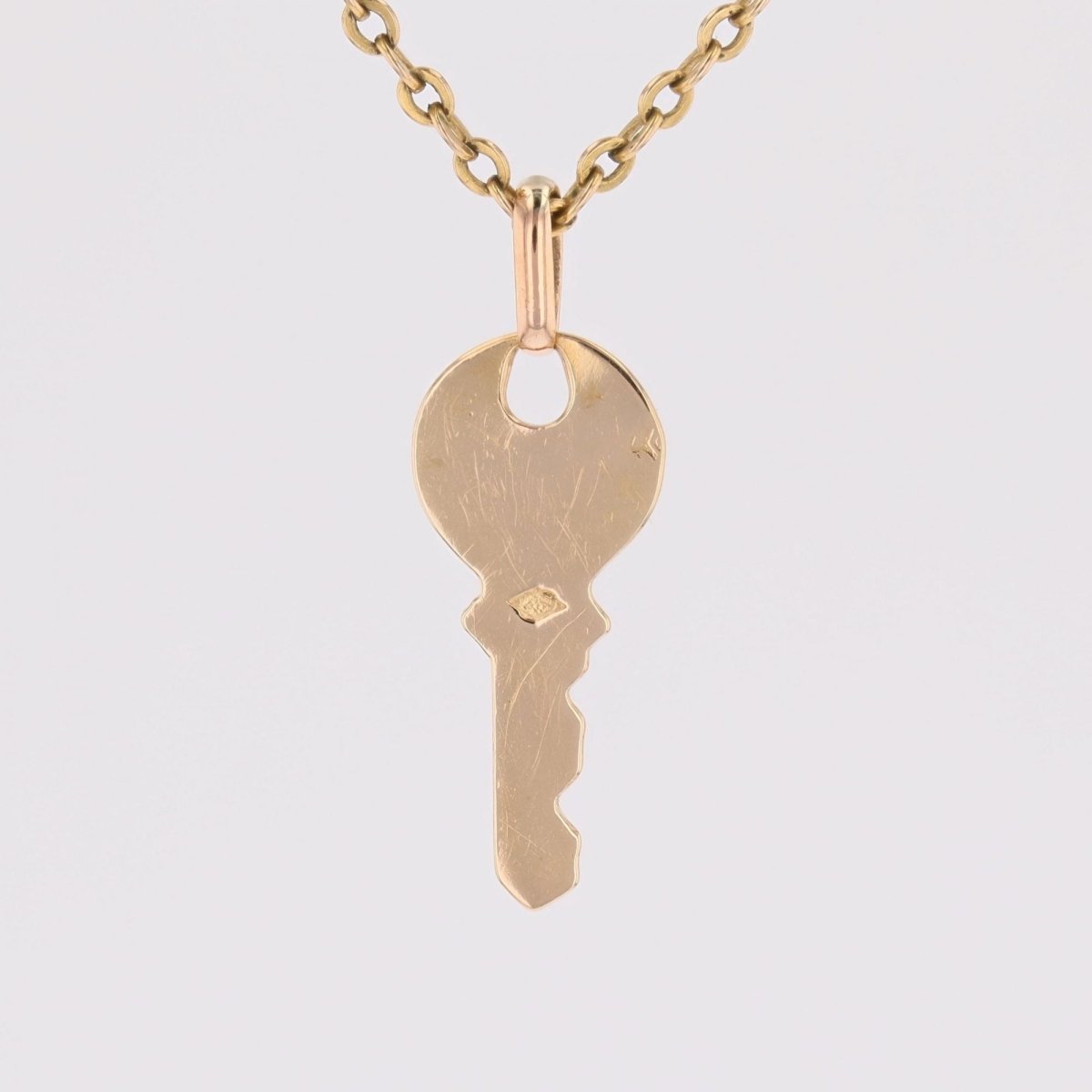 Key charm pendant yellow gold
