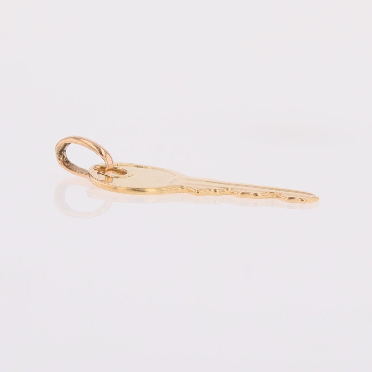 Key charm pendant yellow gold