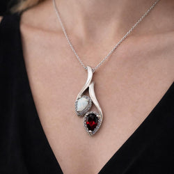 Pendentif en or blanc, opale, grenat et diamants - Castafiore
