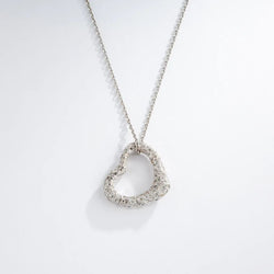 Pendentif en or gris formant un cœur pavée de diamants - Castafiore