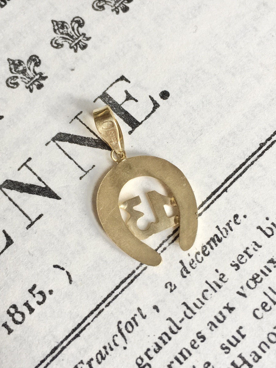 Pendentif en or jaune 18K en forme de fer à cheval - Castafiore