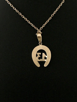 Pendentif en or jaune 18K en forme de fer à cheval - Castafiore