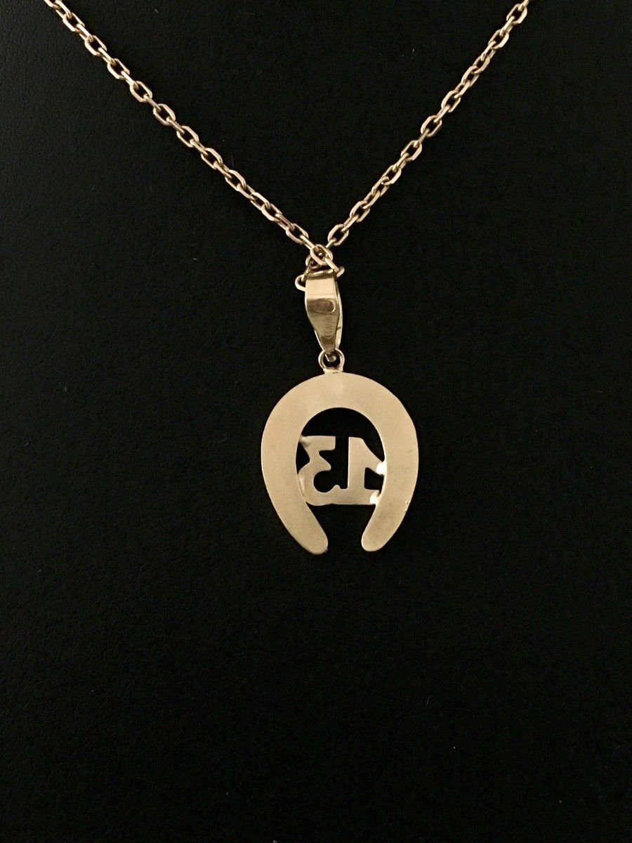 Pendentif en or jaune 18K en forme de fer à cheval - Castafiore