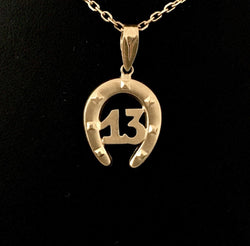Pendentif en or jaune 18K en forme de fer à cheval
