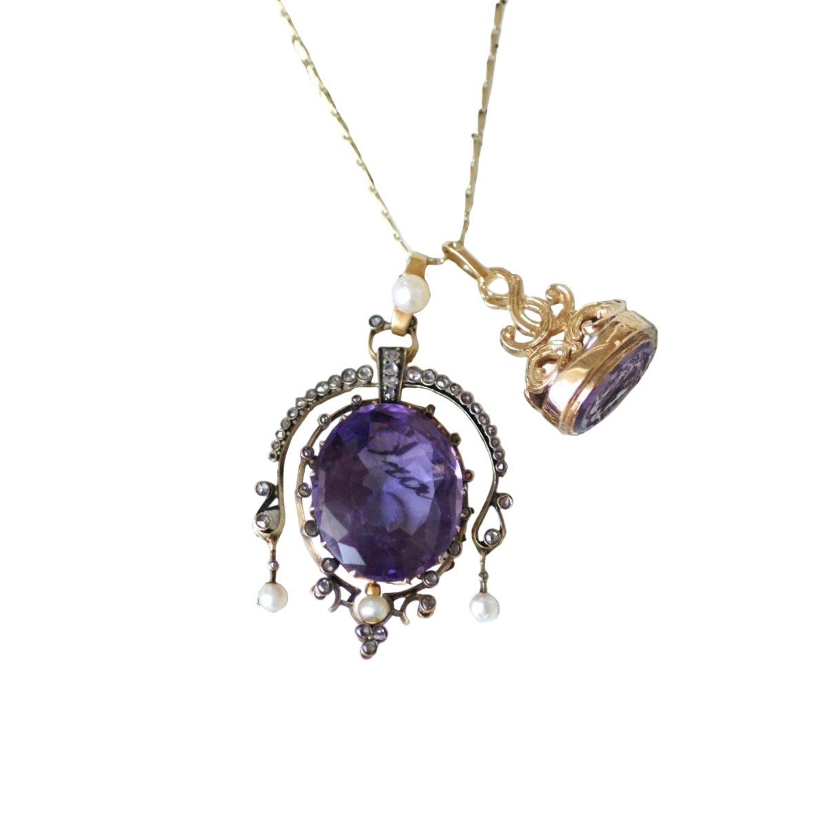 Pendentif en or jaune, argent, améthyste, perle, et diamants - Castafiore