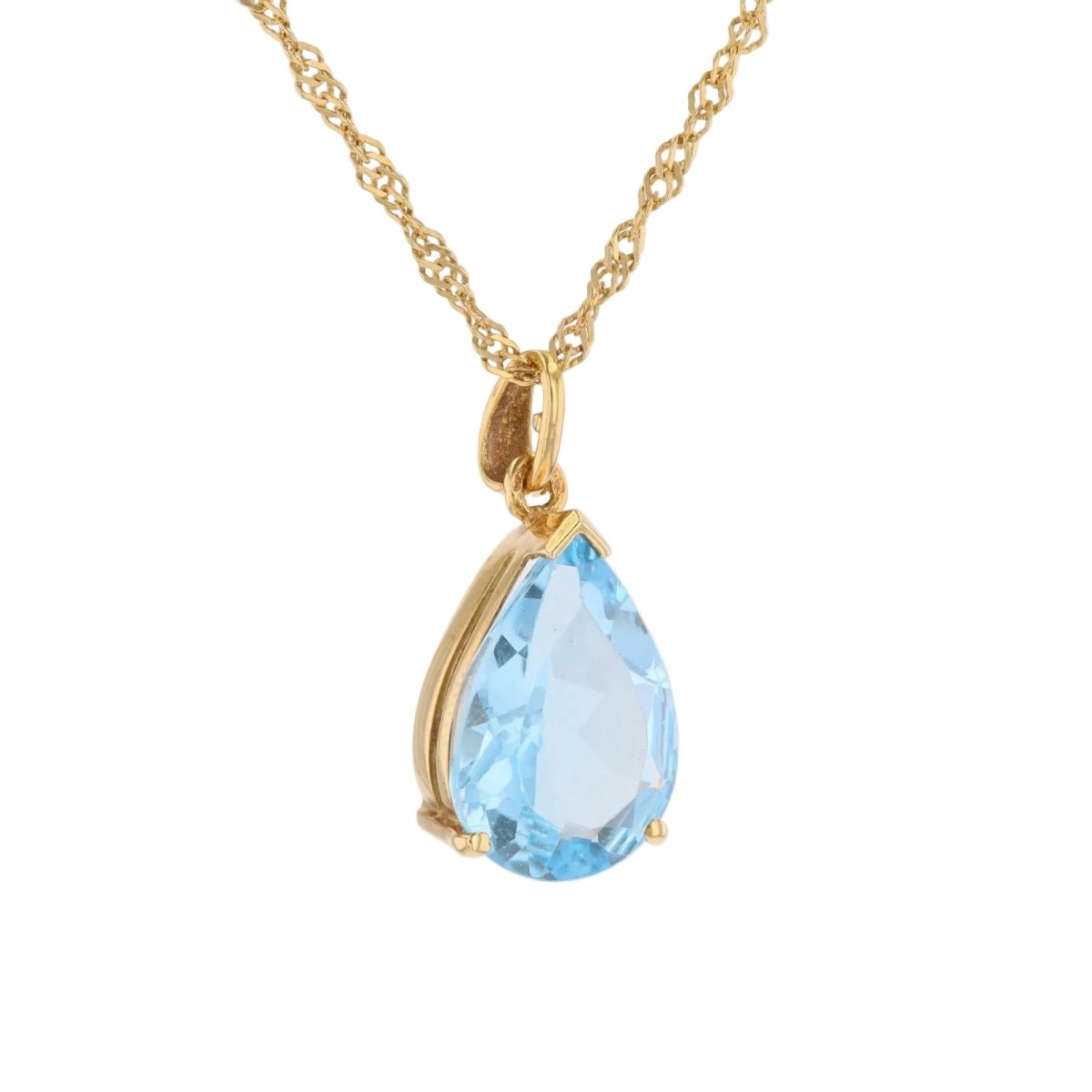 Pear-cut topaz pendant with twisted chain yellow gold