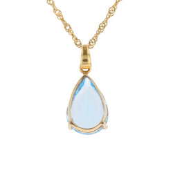 Pear-cut topaz pendant with twisted chain yellow gold