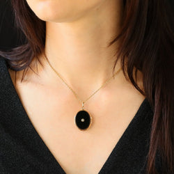Antique onyx gold medallion with fine pearl
