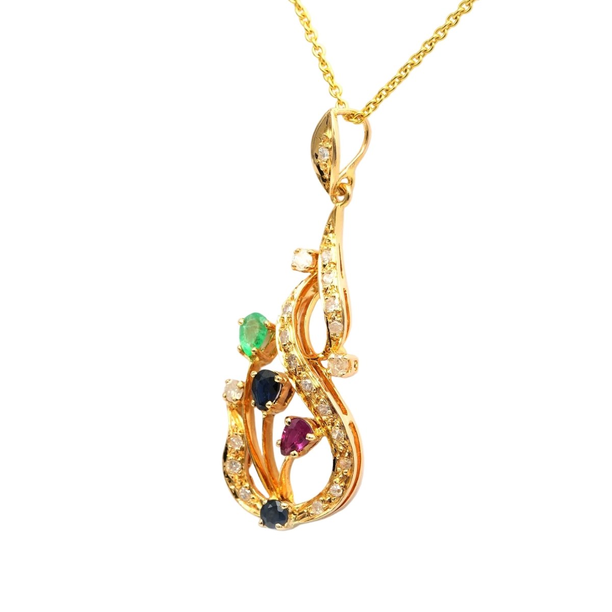 Pendentif en or jaune, rubis, saphirs, émeraudes et diamants - Castafiore