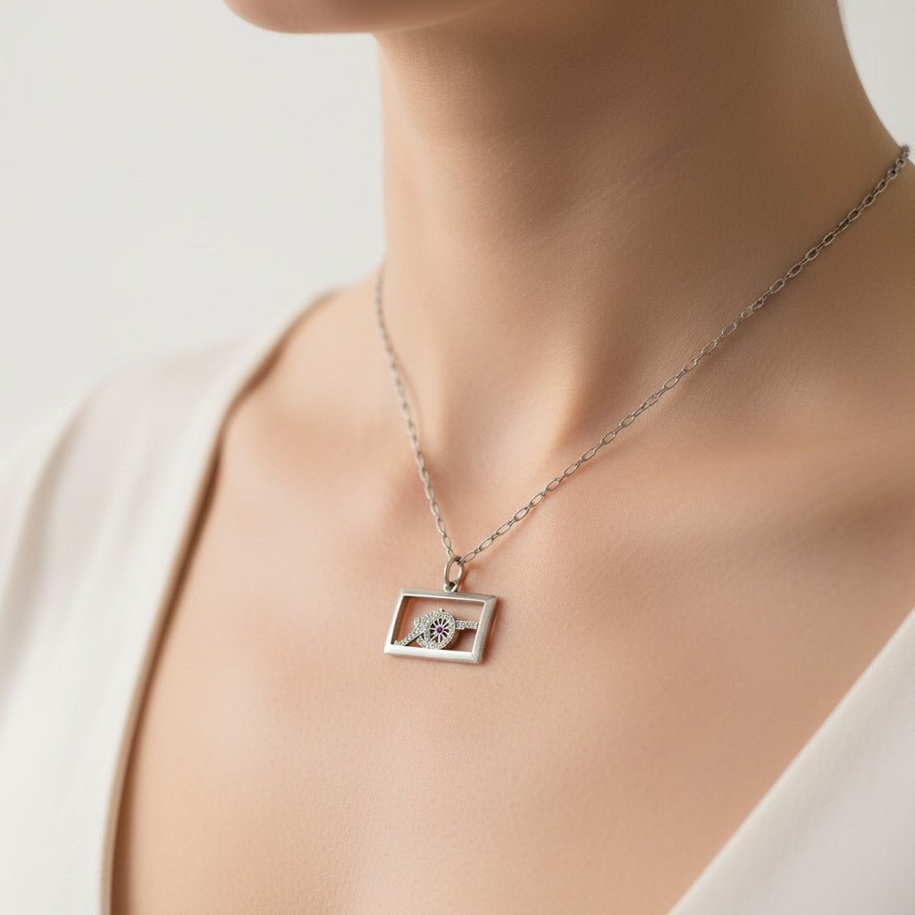 Pendentif en platine, rubis et diamants - Castafiore