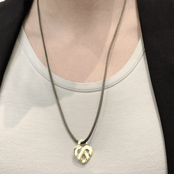 Pendentif POIRAY "Coeur entrelacé" en or jaune - Castafiore