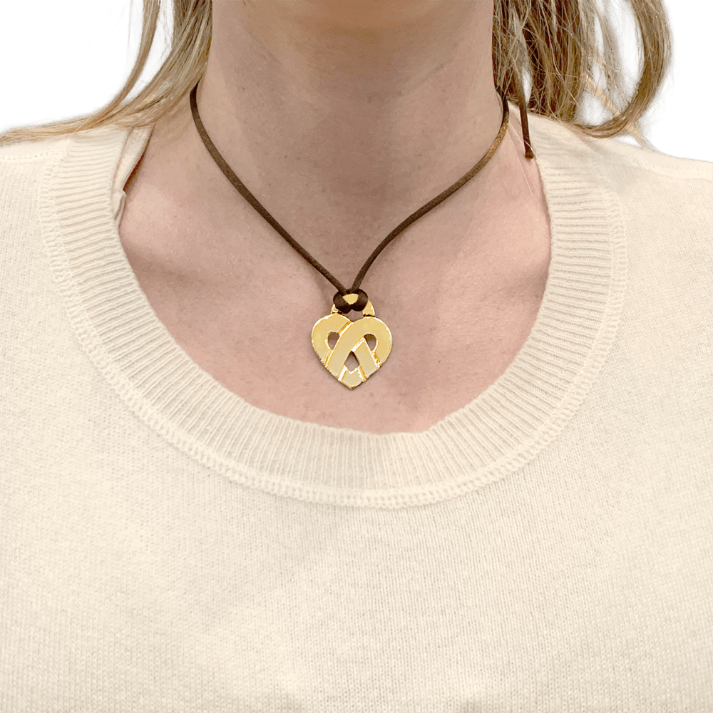 Poiray pendant, "Coeur Entrelacé", yellow gold.