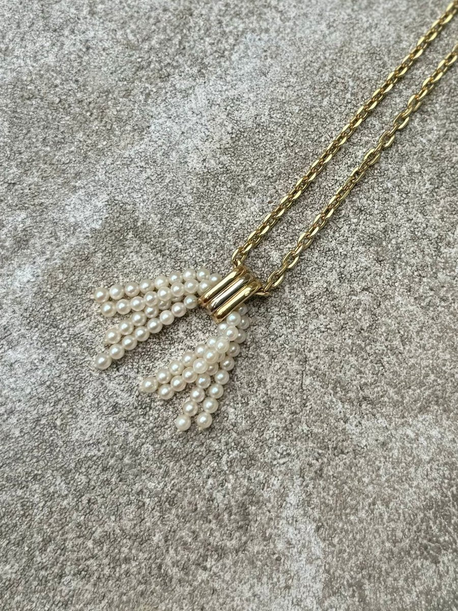 Pendentif pompon de perles de Cartier - Castafiore