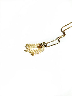 Pendentif pompon de perles de Cartier - Castafiore