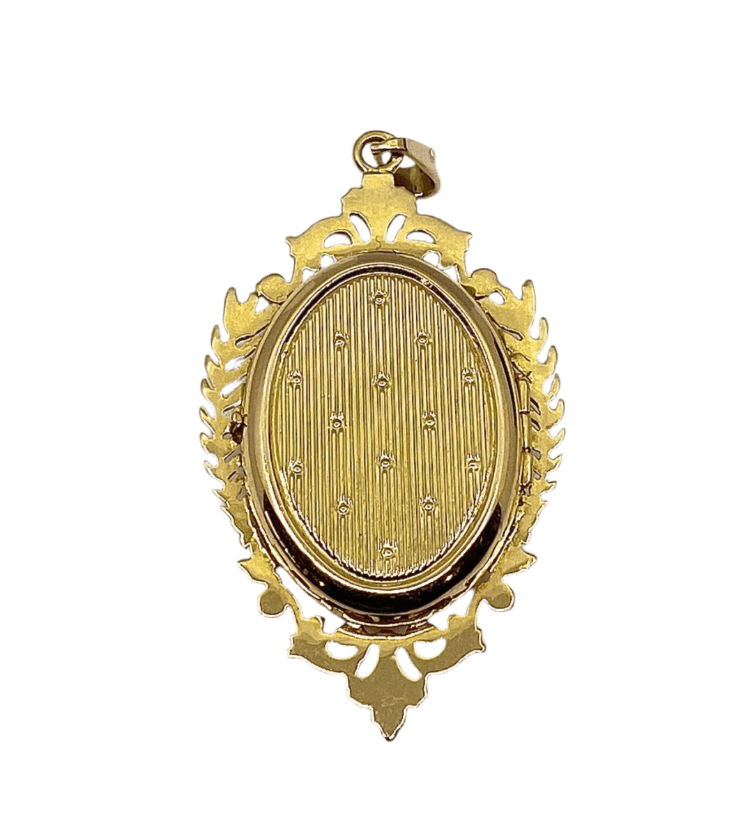 Pendentif Porte Souvenir en or jaune et grenat - Castafiore