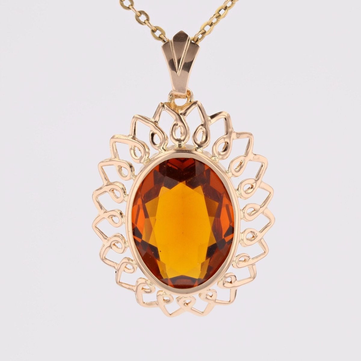 Pendentif vintage en or rose et verre orange - Castafiore