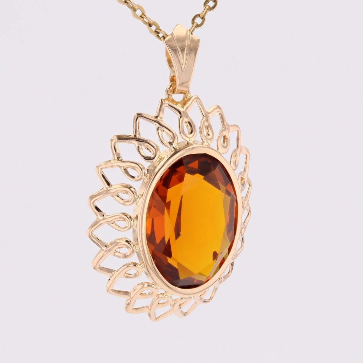 Pendentif vintage en or rose et verre orange - Castafiore