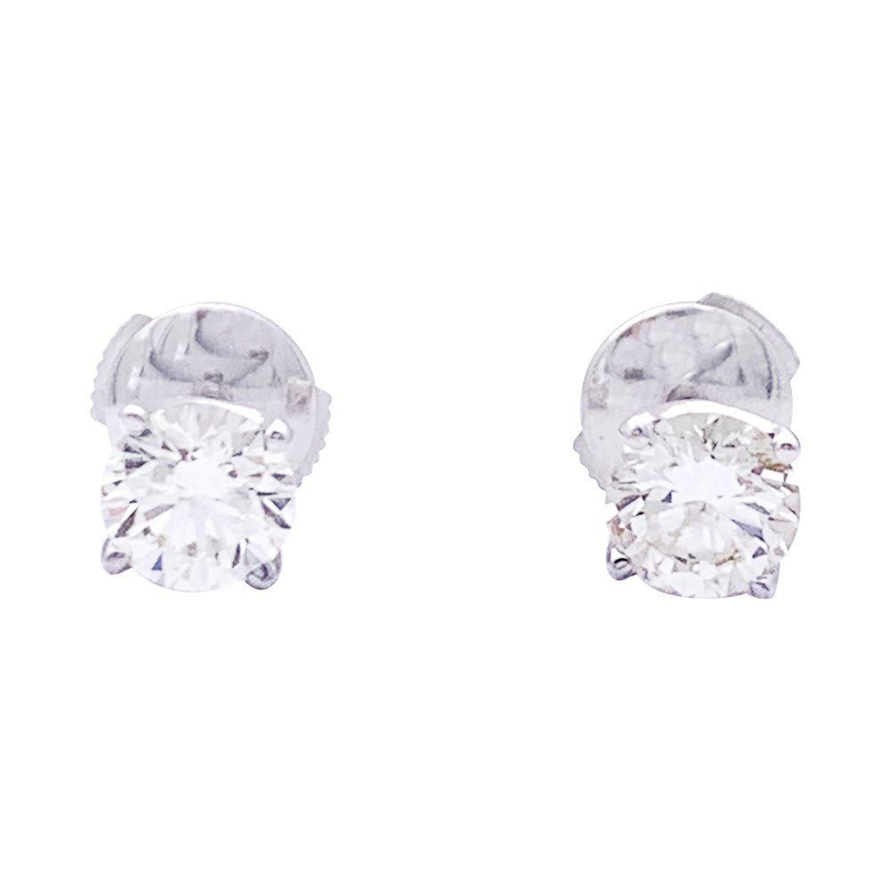 Puces d'oreilles en or blanc et diamants. - Castafiore