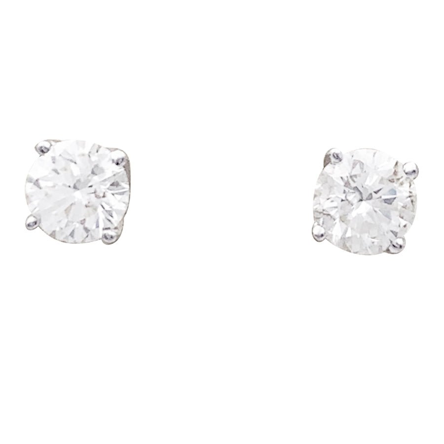 Puces d'oreilles en or blanc et diamants. - Castafiore