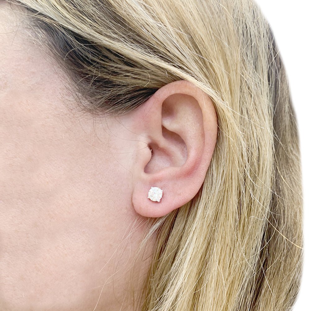 Puces d'oreilles en or blanc et diamants. - Castafiore