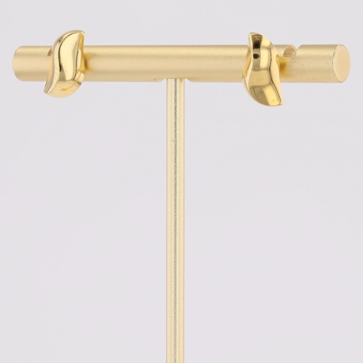 Puces d'oreilles or jaune virgule bombée - Castafiore