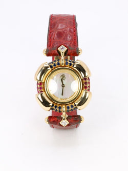 RENE BOIVIN Montre Chrysalide or jaune rubis saphirs diamants - Castafiore