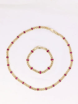 Sautoir à transformation vintage en or jaune et rubis ovales - Castafiore
