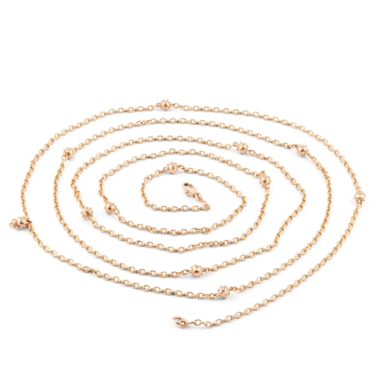 Sautoir ancien en or jaune orné de petites boules - Castafiore