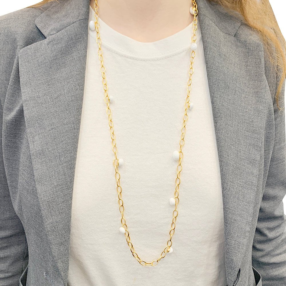 Sautoir Pomellato, "Capri", or rose, céramique blanche. - Castafiore