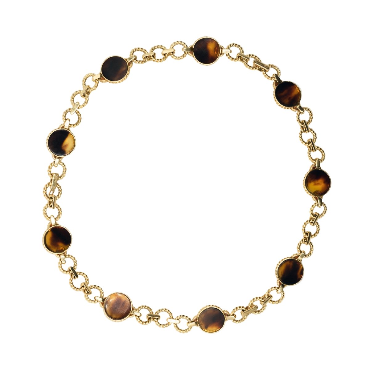 Trois bracelets BOUCHERON en or jaune et corail - Castafiore